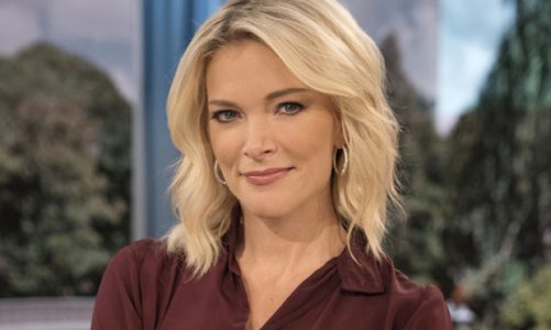 Blonde Caucasian woman (Megyn Kelly) sitting against a blurred background of trees.