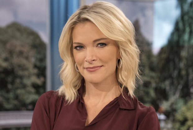 Blonde Caucasian woman (Megyn Kelly) sitting against a blurred background of trees.